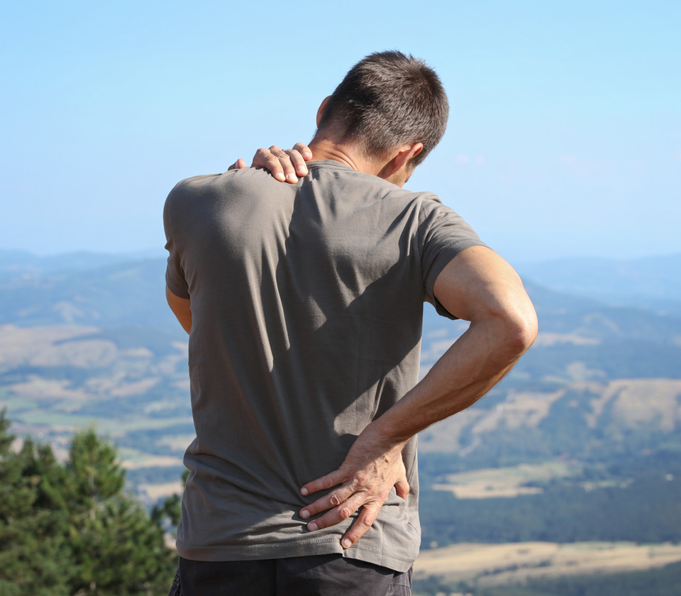 Person noticing discomfort through the shoulder and back
